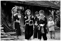 Hmong family in front of their home, near Tam Duong. Northwest Vietnam (black and white)