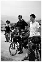 Western adventure travellers on mountain bikes, near Tam Duong. Northwest Vietnam (black and white)