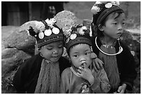 Black Dzao children wearing the hat with three coins, between Tam Duong and Sapa. Northwest Vietnam (black and white)