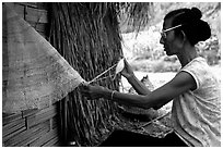 Woman sewing a net, between Lai Chau and Tam Duong. Northwest Vietnam (black and white)