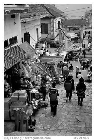 Black Hmong people in the steep streets of Sapa. Sapa, Vietnam