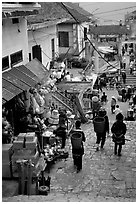 Black Hmong people in the steep streets of Sapa. Sapa, Vietnam (black and white)