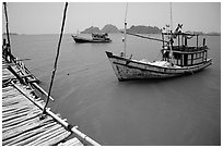 Fishing boats in the China sea. Hong Chong Peninsula, Vietnam (black and white)