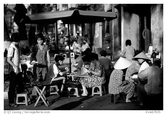 Eating in a street restaurant. Ho Chi Minh City, Vietnam