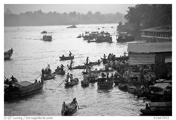 Busy river  at sunrise. Can Tho, Vietnam (black and white)