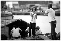 Unloading watermelons from a boat. Ha Tien, Vietnam (black and white)