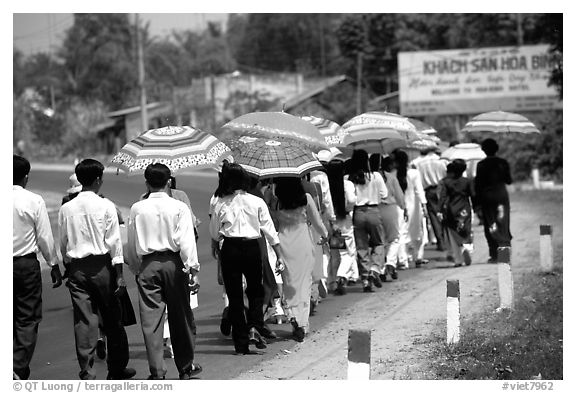 Countryside wedding procession. Ben Tre, Vietnam (black and white)