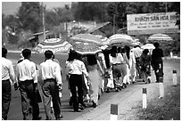 Countryside wedding procession. Ben Tre, Vietnam (black and white)