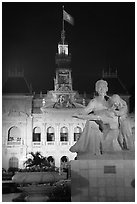 City townhall and Ho Chi Minh sculpture. Ho Chi Minh City, Vietnam (black and white)