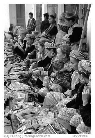 Flower hmong women sell colorful clothing at the market. Bac Ha, Vietnam (black and white)