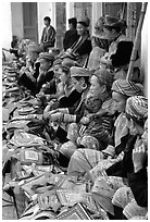 Flower hmong women sell colorful clothing at the market. Bac Ha, Vietnam ( black and white)