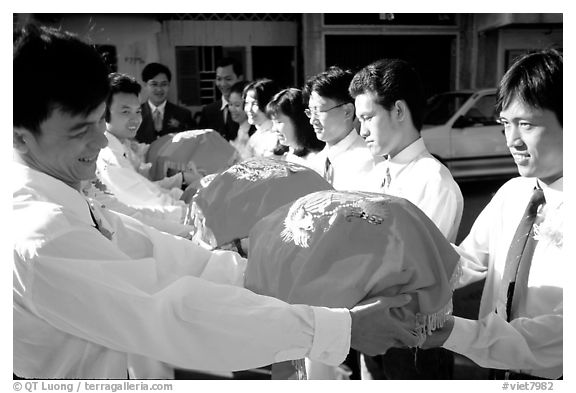 Gifts are exchanged in front of the bride's home. Ho Chi Minh City, Vietnam (black and white)