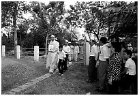 Procession at a countryside funeral. Ben Tre, Vietnam (black and white)