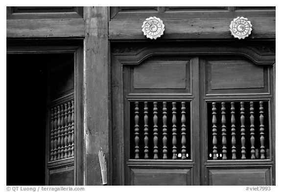 Detail of a wooden facade, Hoi An. Hoi An, Vietnam (black and white)