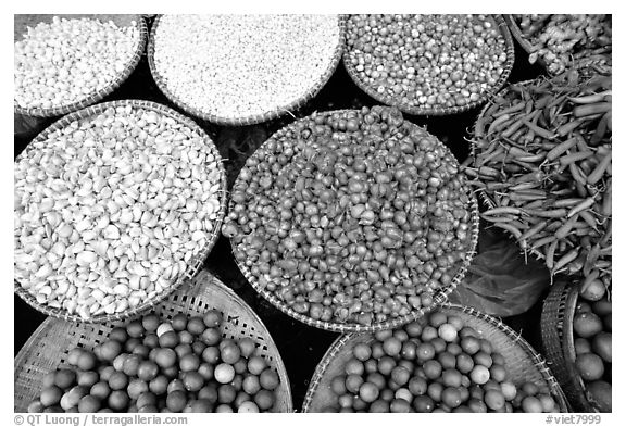 Baskets of condiments for sale. Cholon, Ho Chi Minh City, Vietnam (black and white)