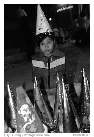 Child on Christmas night. Ho Chi Minh City, Vietnam (black and white)