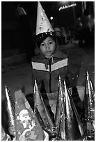 Child on Christmas night. Ho Chi Minh City, Vietnam (black and white)