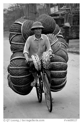 How large a load can you have on  a bicycle ?  On the way to the Perfume Pagoda. Vietnam (black and white)