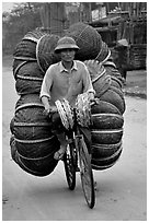 How large a load can you have on  a bicycle ?  On the way to the Perfume Pagoda. Vietnam (black and white)