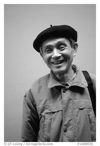 Man wearing the French beret, Hanoi. Vietnam (black and white)