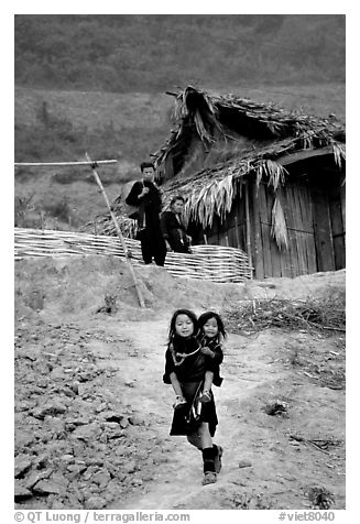 Black Hmong girl and family. Sapa, Vietnam (black and white)