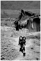Black Hmong girl and family. Sapa, Vietnam ( black and white)