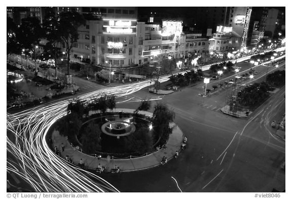 Intersection of Le Loi and Nguyen Hue boulevards at night. Ho Chi Minh City, Vietnam (black and white)