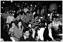 Traffic: motorcycles densely packed on a holiday night. Ho Chi Minh City, Vietnam (black and white)