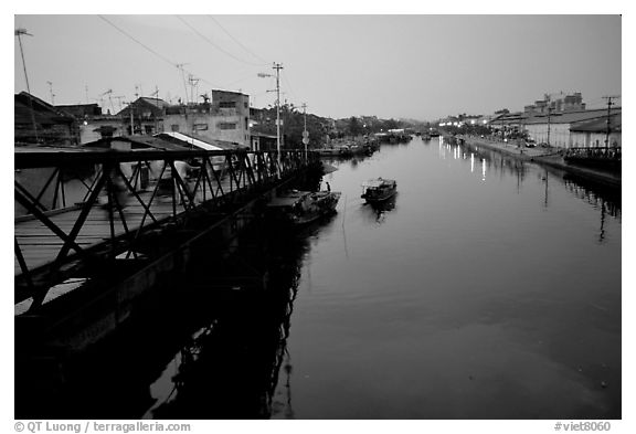 Evening on the Saigon arroyo. Cholon, Ho Chi Minh City, Vietnam (black and white)