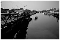 Evening on the Saigon arroyo. Cholon, Ho Chi Minh City, Vietnam ( black and white)