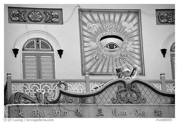 The Cao Dai religion most noteworthy symbol is the all seeing  eye. Tay Ninh, Vietnam (black and white)