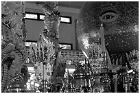 Globe with Cao Dai eye inside the great temple. Tay Ninh, Vietnam ( black and white)