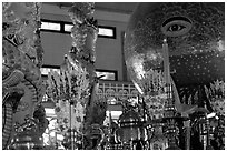 Globe with Cao Dai eye inside the great temple. Tay Ninh, Vietnam ( black and white)