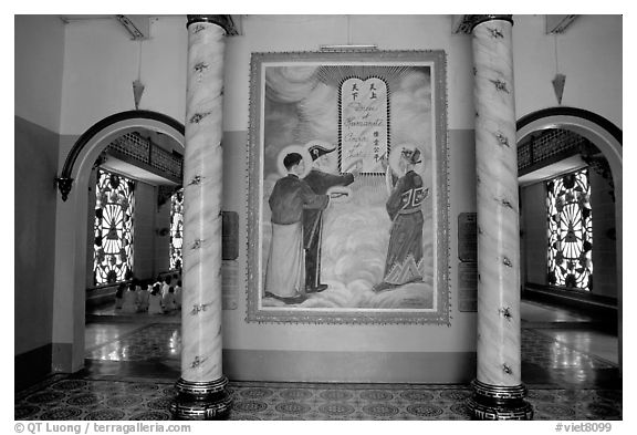 Cao Dai saints: Chinese revolutionary leader Sen, French poet Hugo, and vietnamese poet Nguyen Binh Khiem. Tay Ninh, Vietnam (black and white)