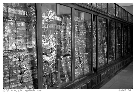 Gold-embroided dresses offered to Lady Chua Xu,. Chau Doc, Vietnam (black and white)