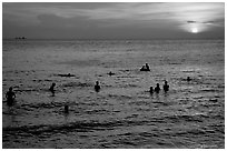 Soaking in the warm China sea at sunset. Vung Tau, Vietnam (black and white)