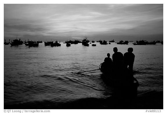Fishing boat fleet at sunset. Vung Tau, Vietnam (black and white)