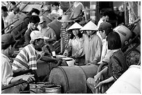 Filling up water tanks for the day. Ha Tien, Vietnam ( black and white)