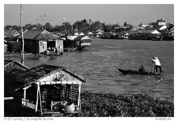 Floating houses on the Hau Gian river. Chau Doc, Vietnam (black and white)