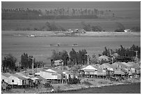 Stilts houses and inundated rice fields. Chau Doc, Vietnam (black and white)