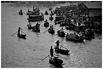 River activity at sunrise. Can Tho, Vietnam (black and white)