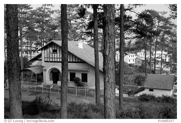 Basque style villa of colonial period in the pine-covered hills. Da Lat, Vietnam (black and white)