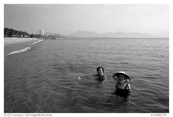 Early morning bath on a perfect beach Nha Trang. Vietnam