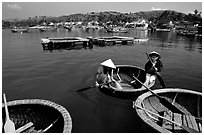 Circular basket boats, typical of the central coast, Nha Trang. Vietnam (black and white)