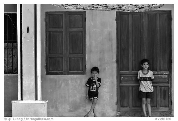 Children in front of old house, Hoi An. Hoi An, Vietnam