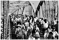 Rush hour on the Trang Tien bridge. The numbers of cars is insignificant compared to Ho Chi Minh city. Hue, Vietnam (black and white)