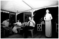 Traditional floating concert on the Perfume river. The city has remained Vietnam's artistic center. Hue, Vietnam (black and white)