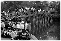 School children at The Huc bridge, Hoan Kiem lake. Hanoi, Vietnam (black and white)