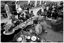 Festing on unusual foods, sunday market. Bac Ha, Vietnam (black and white)