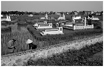Catholic tombs set in rice field. Ninh Binh,  Vietnam (black and white)